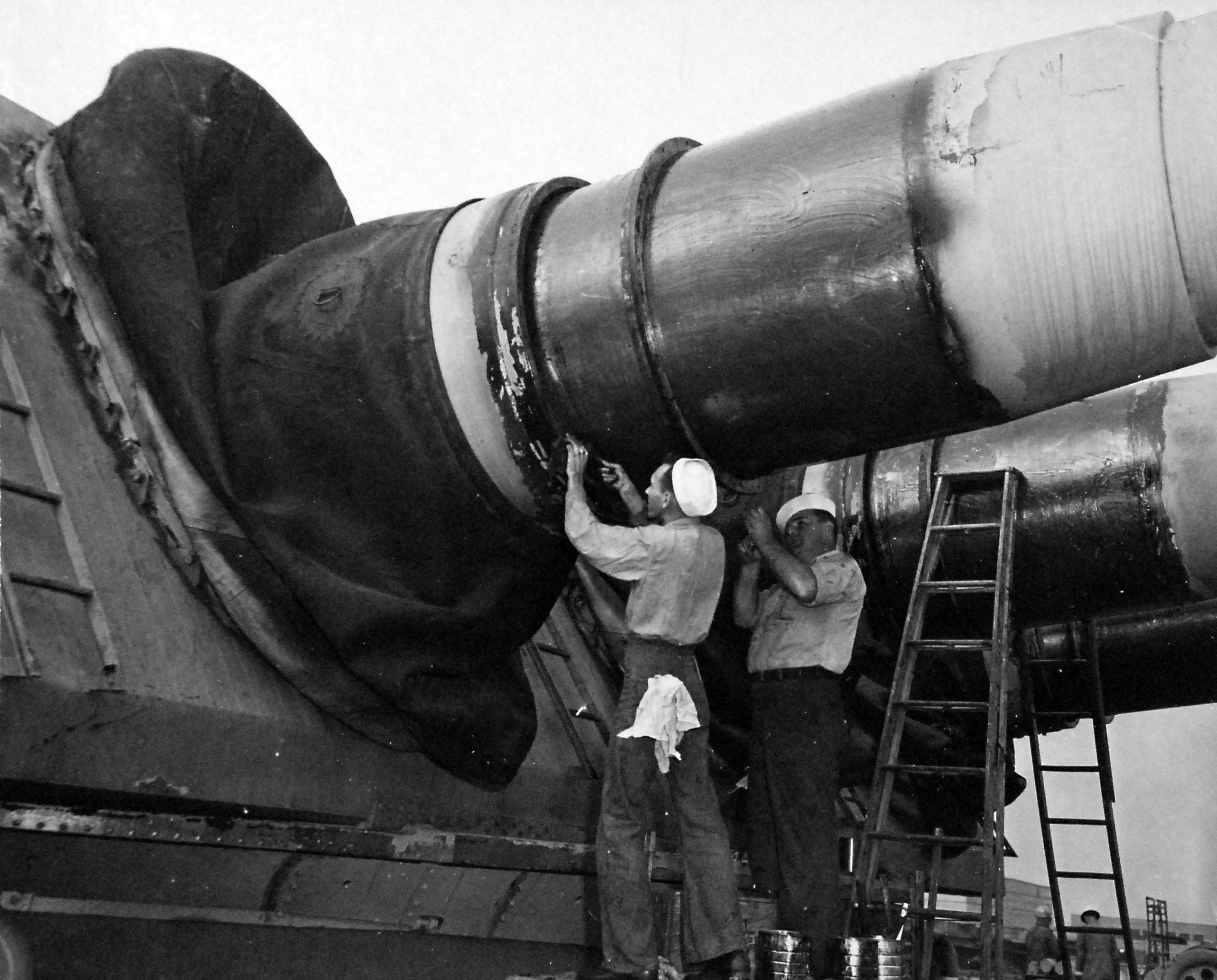 Good view of the size of the 16-inch gun barrels of battleship USS New Jersey’s main battery, Bayonne, New Jersey, United States, 3 Nov 1950.