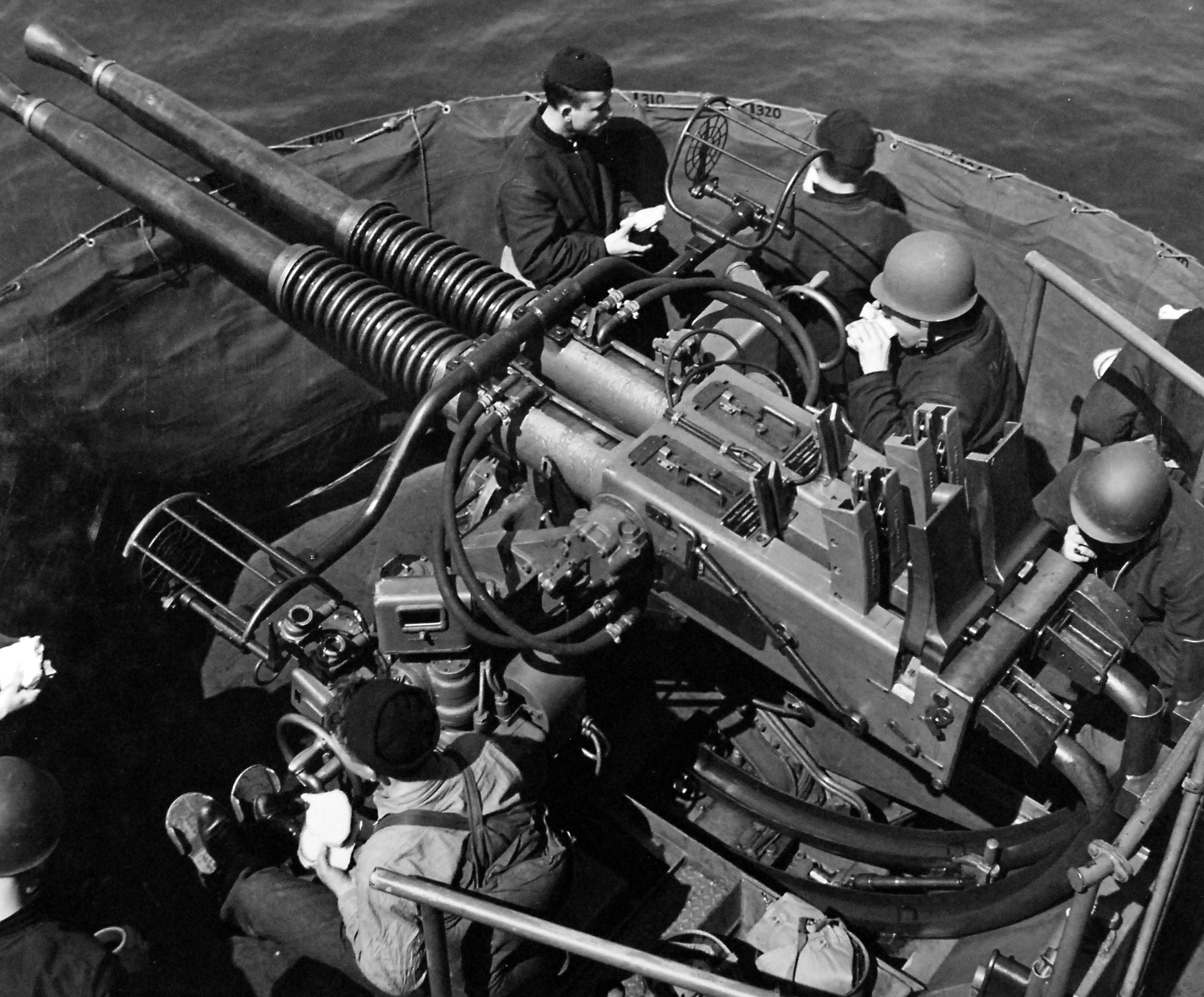 photo-gun-crews-on-a-twin-40mm-bofors-anti-aircraft-mount-take-their