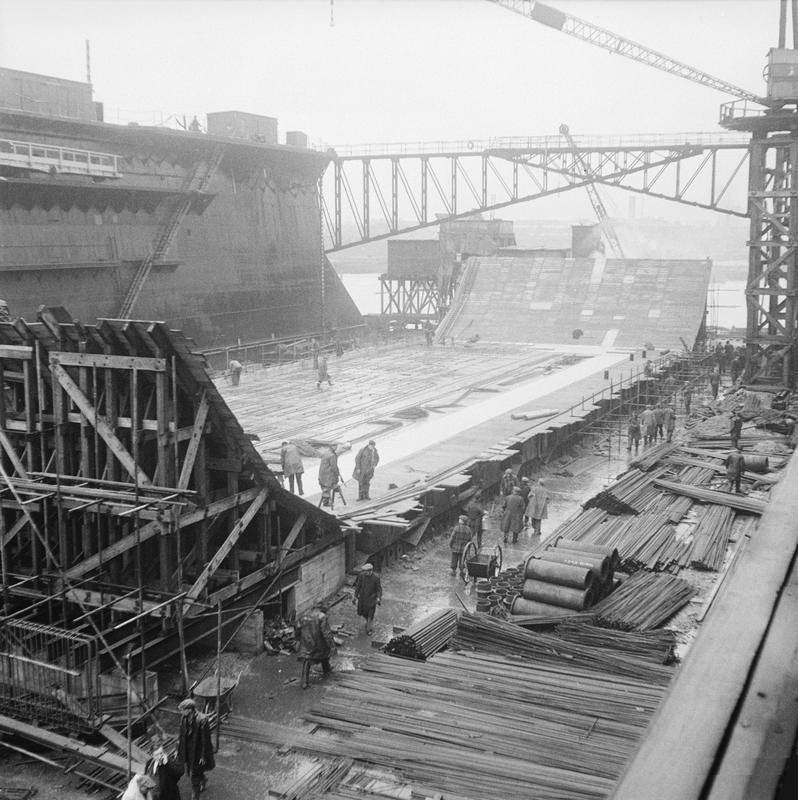 Early construction of a large concrete caisson known as a Phoenix, 27 Jan 1944 in southern England. These had flooding valves and were to be sunk as part of the Mulberry Harbors for the Normandy landings.