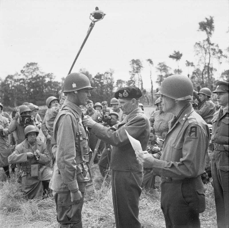 Bernard Montgomery bestowing the British Distinguished Service Order on Maxwell Taylor of the American 101st Airborne Division, Blay, Normandy, France, 7 Jul 1944.