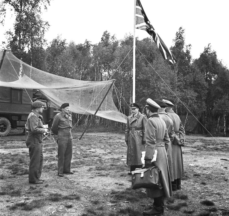 British Field Marshal Bernard Montgomery hosting a delegation of German officers at his headquarters at Lüneburg Heath, Germany to discuss surrender plans, 3 May 1945.