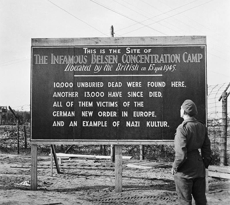 A sign erected by the British at the site of the former Bergen-Belsen Concentration Camp (the camp had been burned to the ground to control the spread of typhus), 29 May 1945.