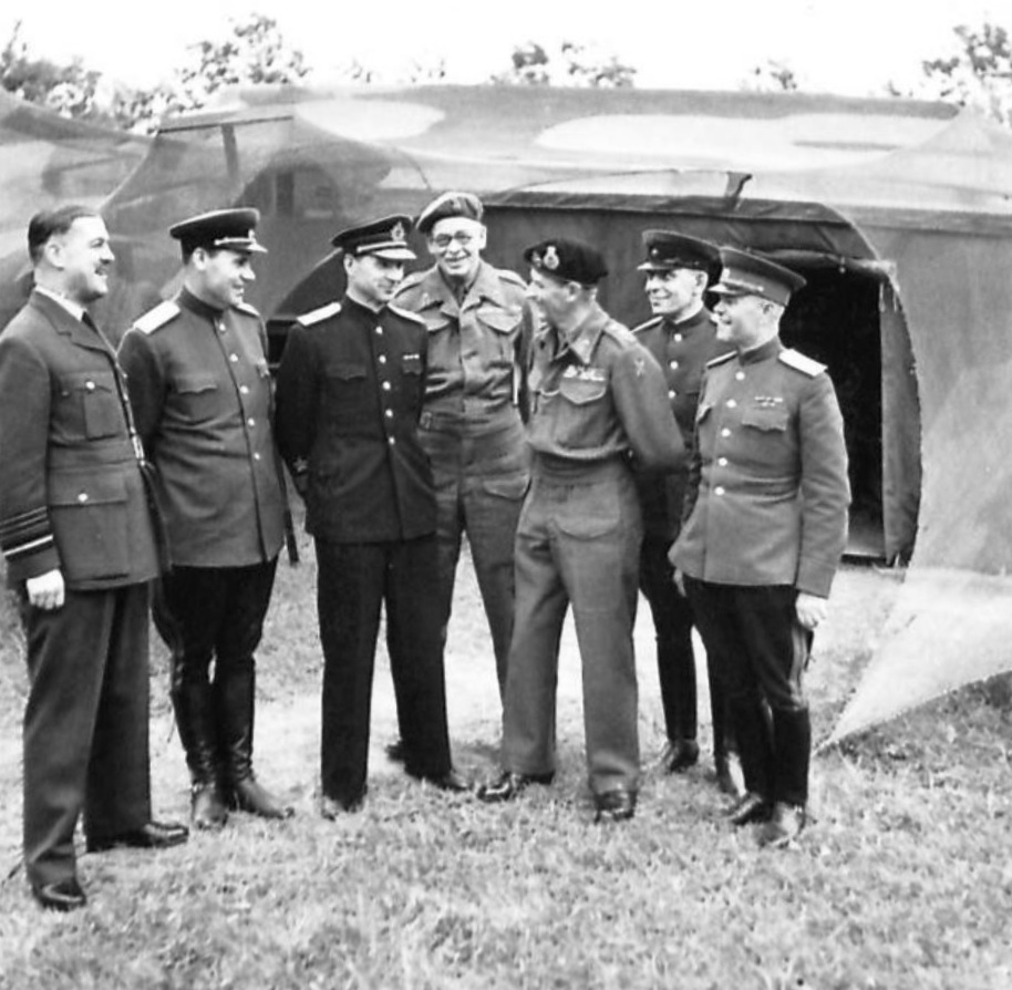 A delegation of high-ranking Soviet officers visiting General Montgomery’s headquarters at Blay, Normandy, France, 26 Jul 1944.