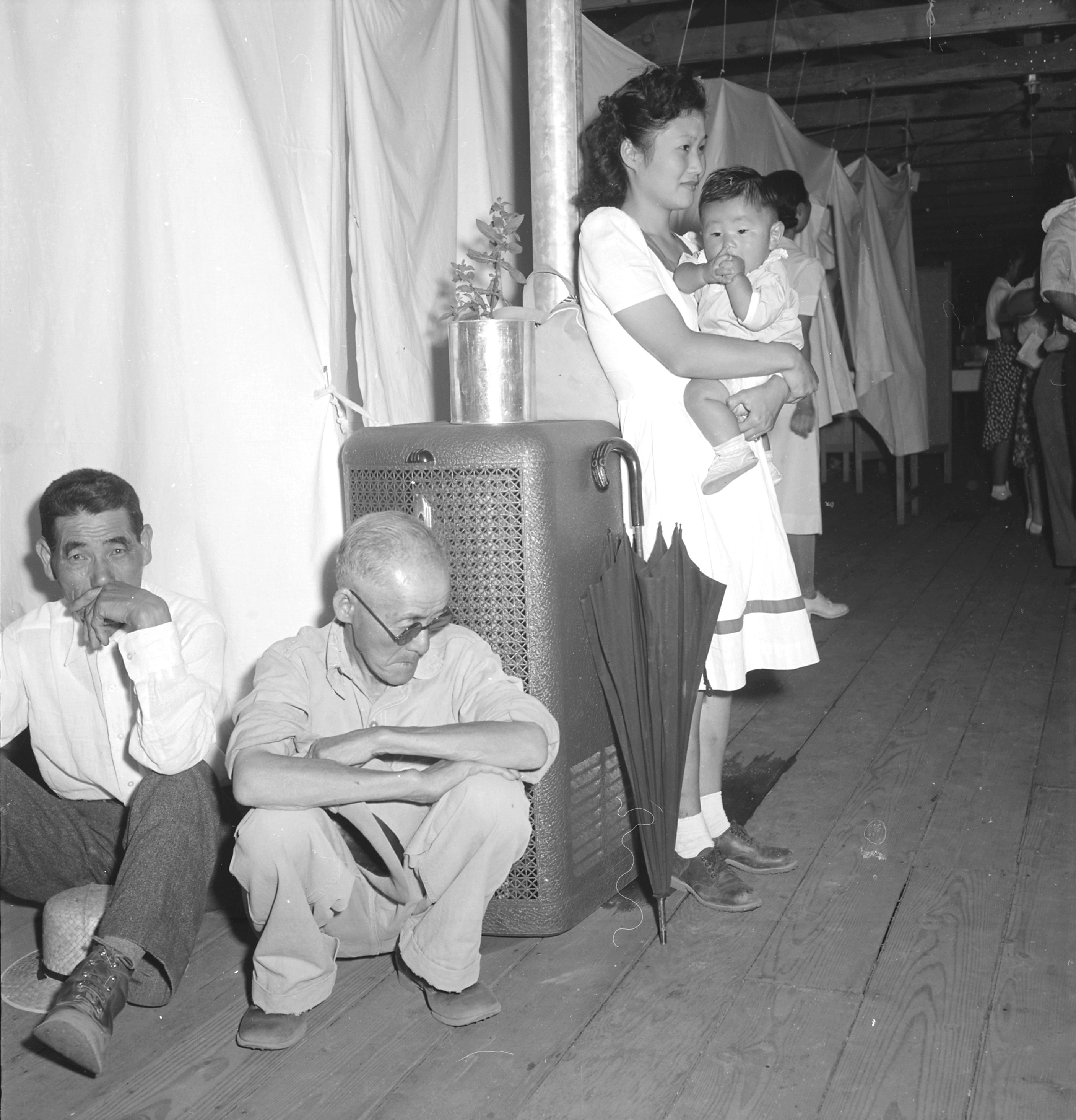 Interior view of a barracks apartment at the Manzanar Relocation Center for deported Japanese-Americans, Inyo County, California, United States, 30 Jun 1942.