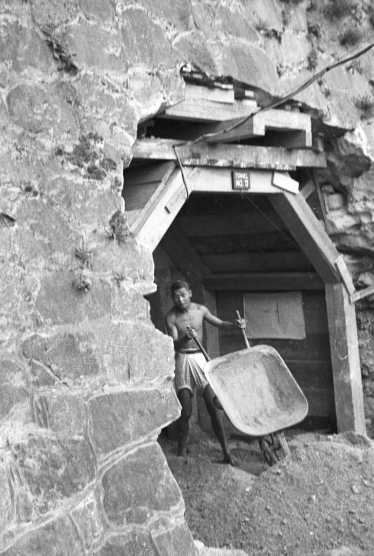 Laborer working on an air raid shelter, Hong Kong, 1941