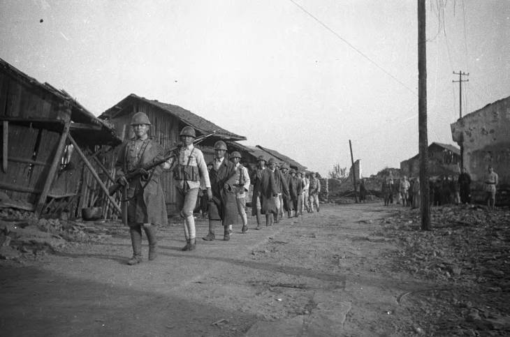 Chinese soldiers parading with recently captured Japanese equpiment, Changde, Hunan Province, China, 25 Dec 1943, photo 1 of 2 