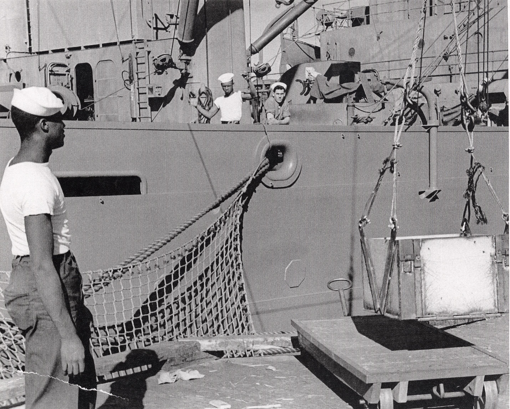 African-American sailors loading munitions aboard ships at Port Chicago, California, United States, 1943-44.