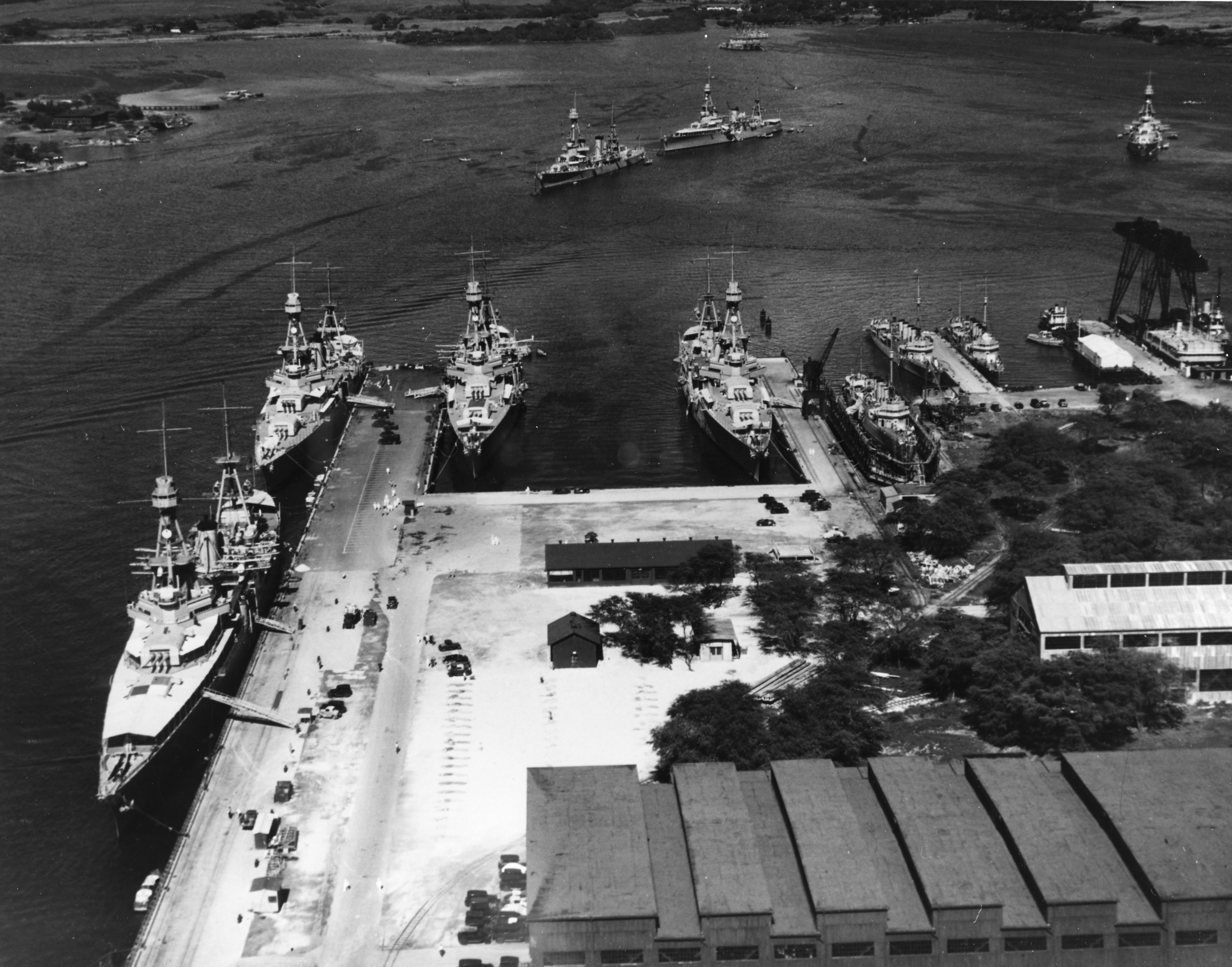 Seven cruisers at Pearl Harbor, Hawaii, 2 Feb 1933. Clockwise from left are Augusta, Chicago, Salt Lake City, Louisville, Pensacola, unidentified destroyer, Fox, Kane (on marine railway), Northampton, and Chester.