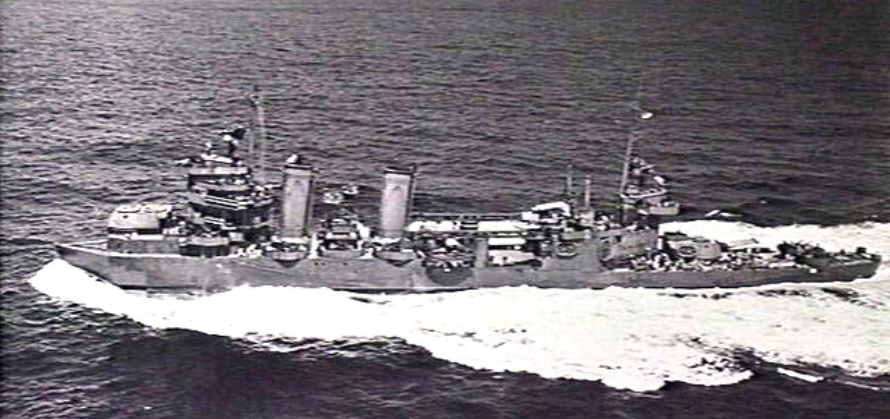 USS New Orleans underway from Sydney, Australia after being fitted with a temporary bow because she was struck by a torpedo in the Battle of Tassafaronga that blew off 150 feet of her bow.