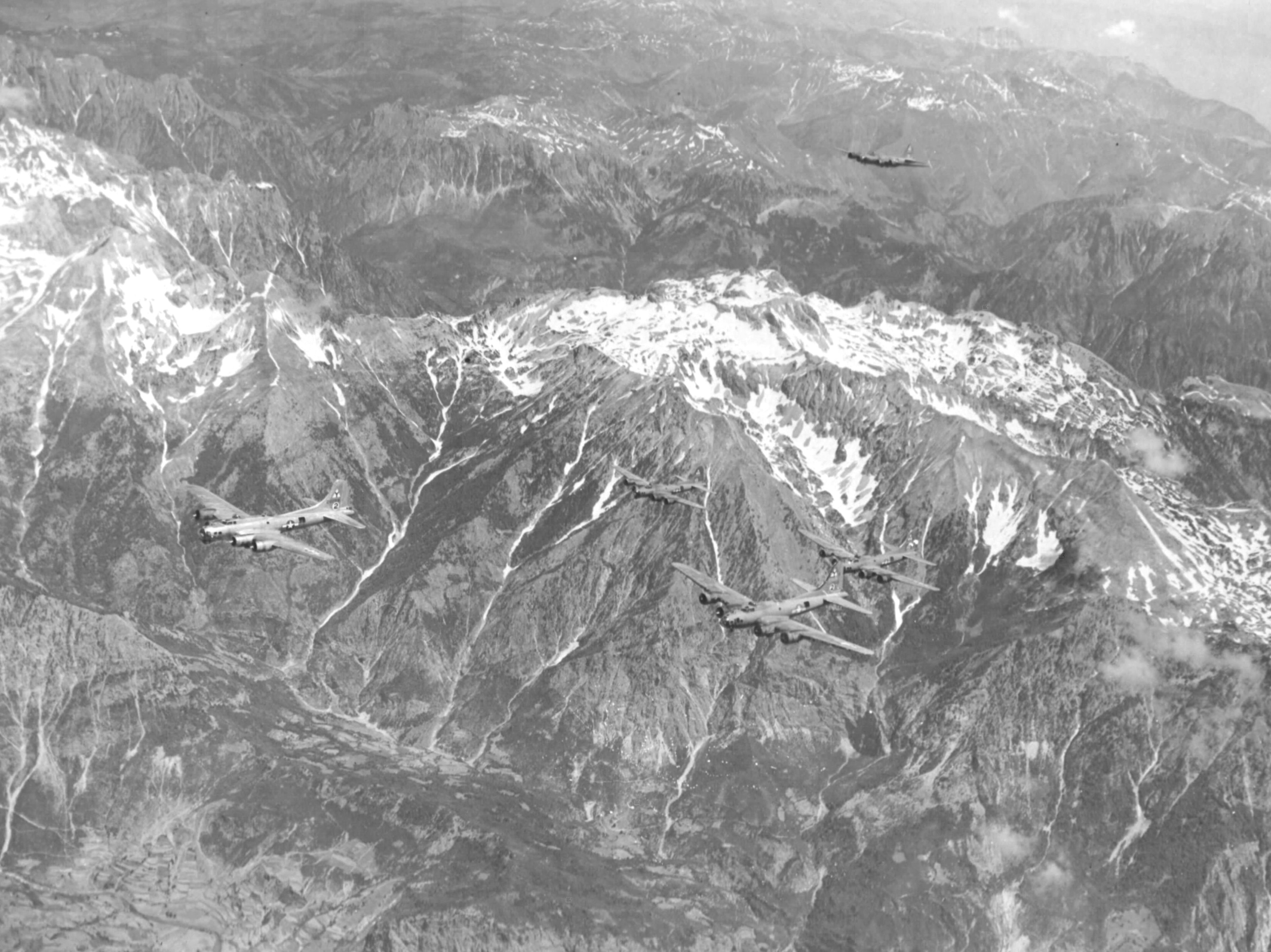 B-17 Fortress bombers of the 97th Bomb Group based in Italy flying over the Dinaric Alps in Yugoslavia on their way to bases in Ukraine as part of Operation Frantic, 2 Jun 1944.