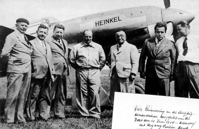 Ernst Udet, Ernst Heinkel, and others with a He 100 aircraft, Germany, 1939