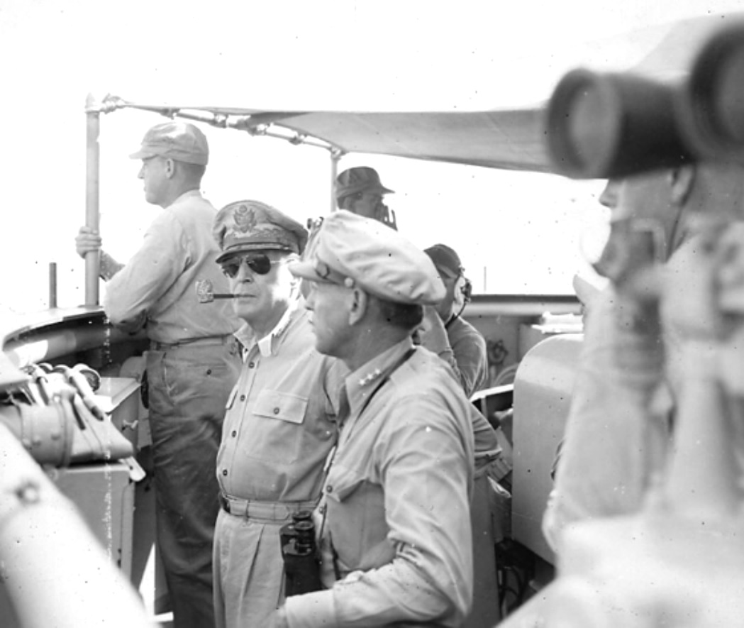 United States Army General Douglas MacArthur and his Chief of Staff, Lieutenant General Richard Sutherland, on the flag bridge of USS Nashville during the Leyte landing operations, Oct 1944.