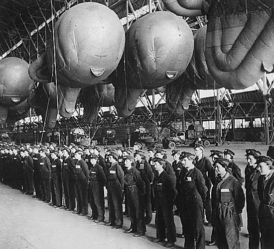 WAAF operating crews with their barrage balloons, possibly RAF Cardington, Bedfordshire, England, United Kingdom, 1940s; note Fordson Sussex-based winch trucks