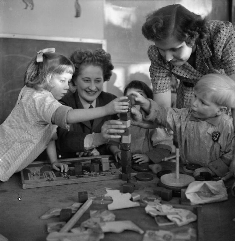 WAAF members who were training to become instructors of the RAF Educational and Vocational Training Scheme visiting a children's day nursery in Edmonton, London, England, United Kingdom, date unknown