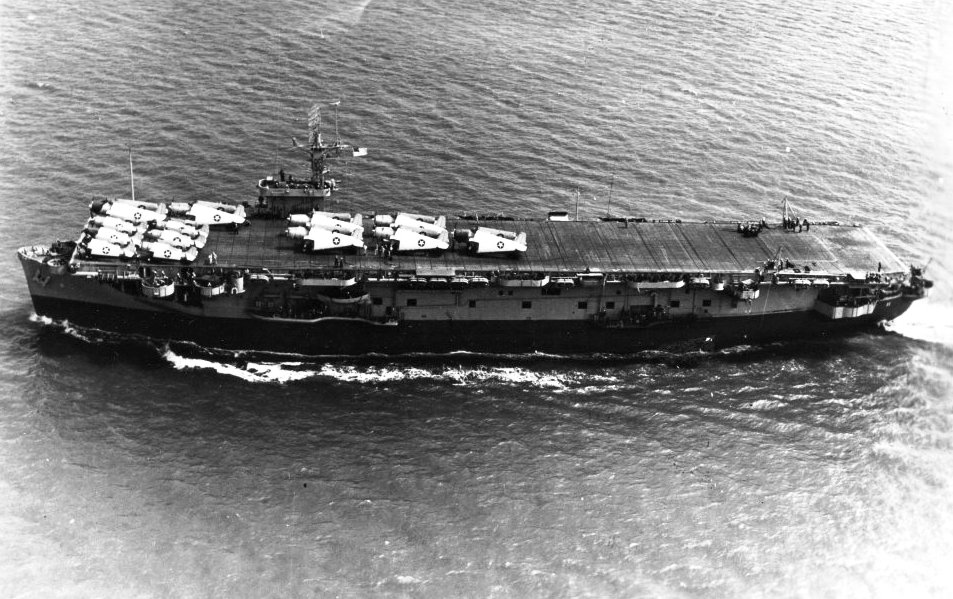 Escort carrier USS Card with TBF-1 Avengers and F4F-4 Wildcats of Composite Squadron VC-1 steaming into the Atlantic, about Aug 1943. Note the airplanes painted white.