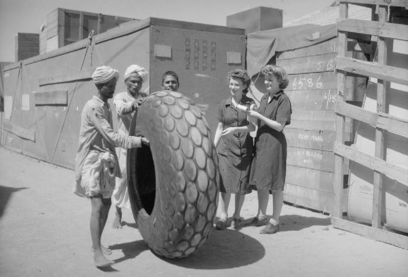 WAAF equipment assistants and Indian laborers at a Maintenance Unit in Bombay, India, 1941-1945