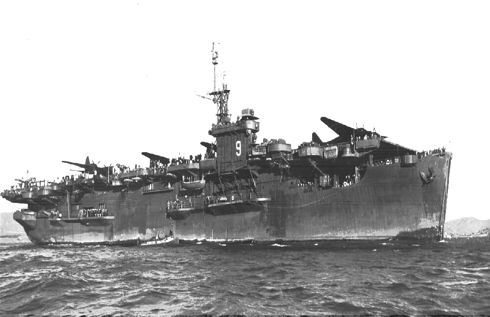 Ending her last operational voyage, escort carrier USS Bogue arrived at Alameda, California, United States, with a deck load of surrendered Japanese aircraft, 8 Jan 1946. Note Bogue’s Measure 21 paint.
