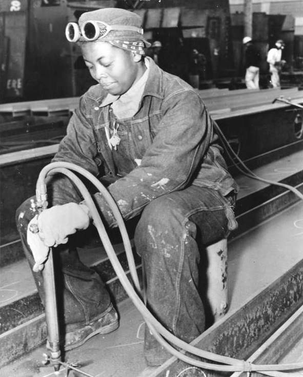 Female African-American shipyard worker Anna Bland working on Liberty ship SS George Washington Carver at Kaiser Richmond No. 1 Yard, Richmond, California, United States, Apr 1943