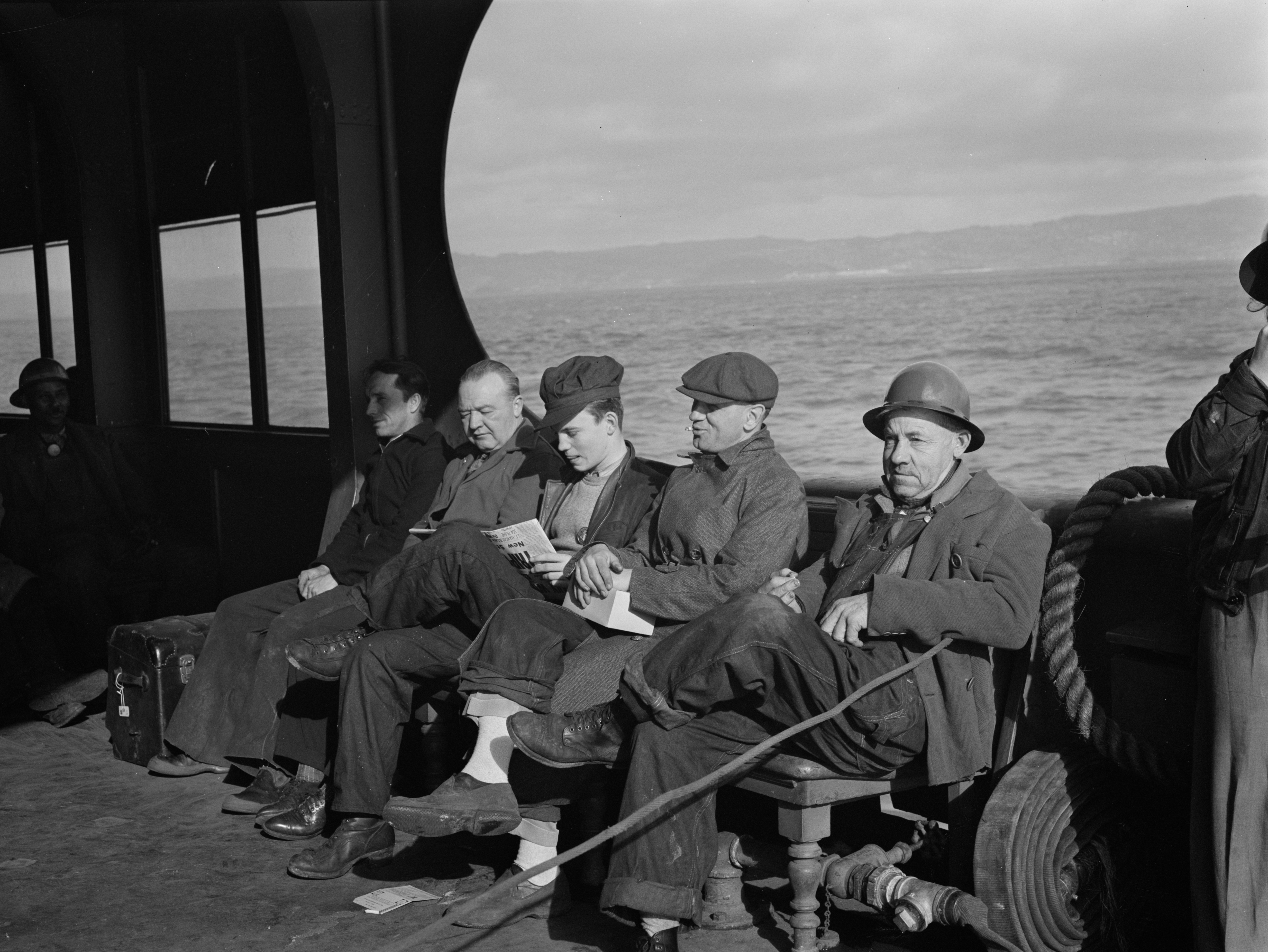 Kaiser Richmond Shipyards workers aboard a ferry between San Francisco and Richmond, California, United States, Feb 1943
