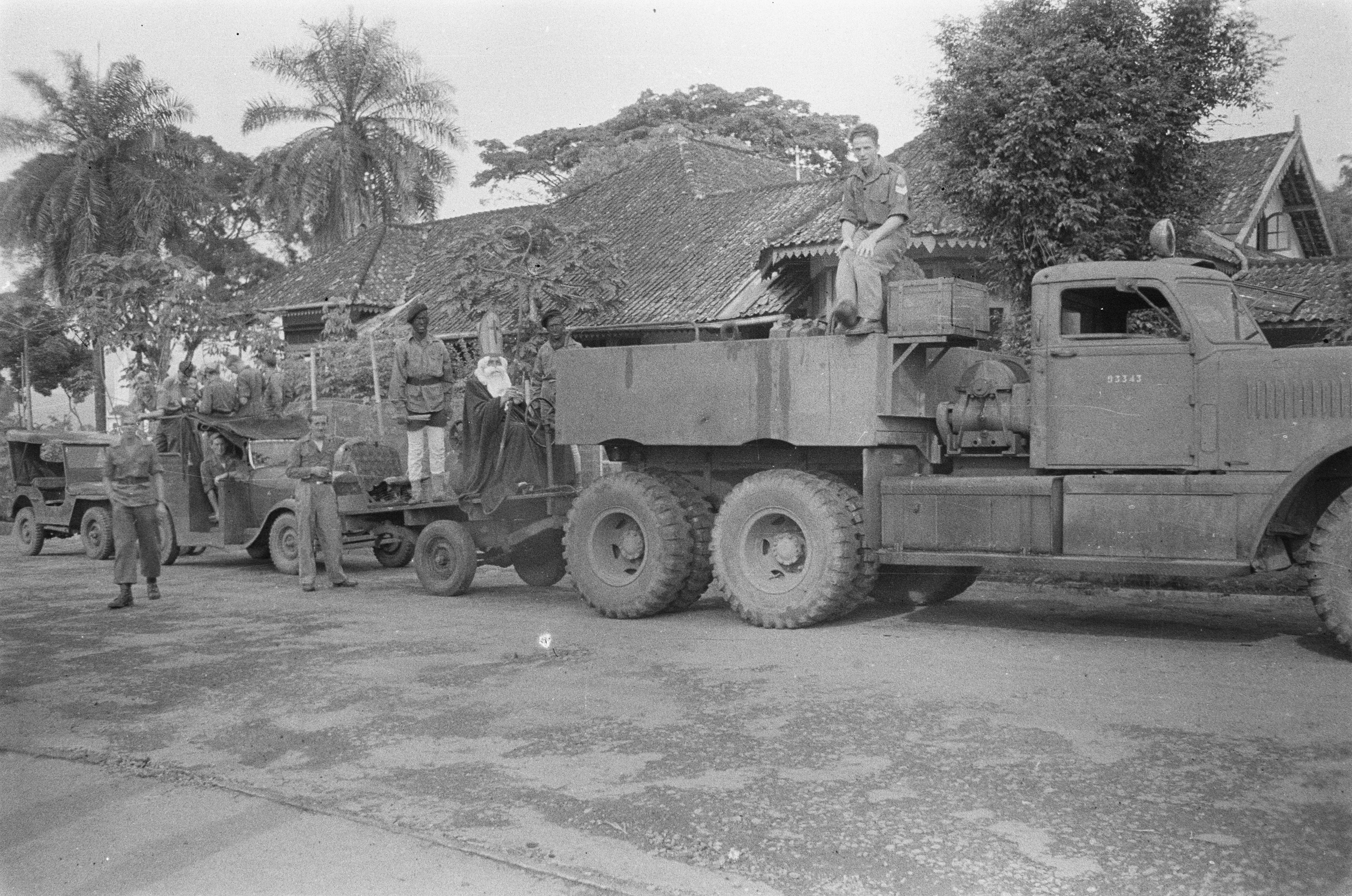 Christmas celebration in Soekaboemi (Sukabumi), Java, Dutch East Indies, 5 Dec 1947; note Diamond T truck
