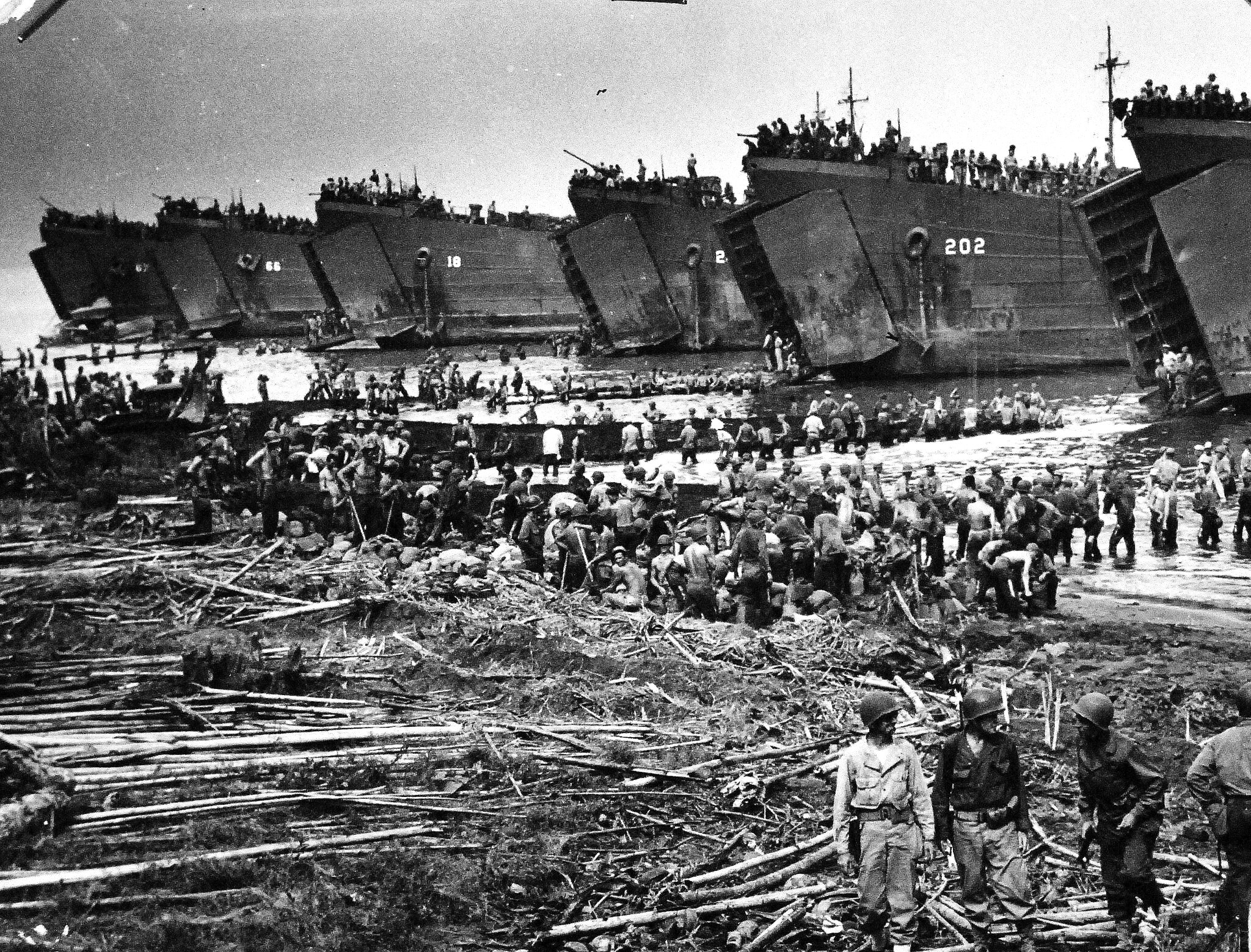 LSTs disembarking troops during the Leyte landings at White Beach, Tacloban, Leyte, Philippines, 20 Oct 1944.