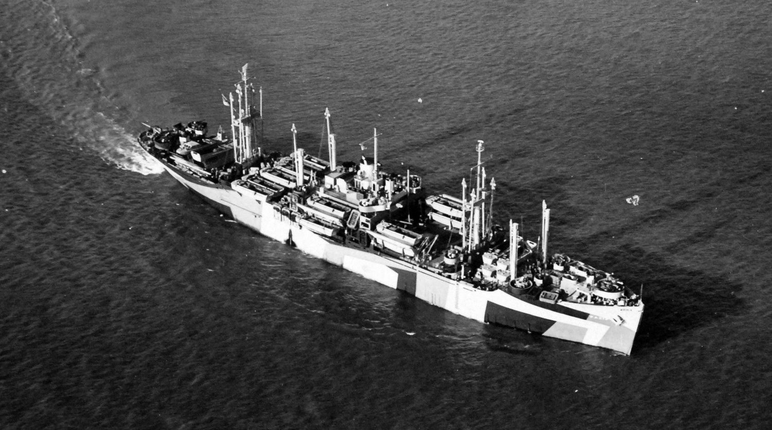 Haskell-class Attack Transport USS Mountrail underway on the west coast of the United States, 5 Dec 1944. Mountrail was built at the Kaiser Richmond Shipyards. Note LCVP landing craft on Mountrail’s deck.