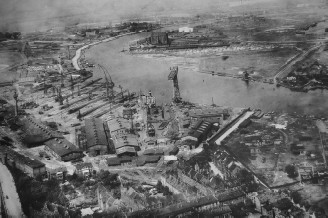 Prewar photograph of F. Schichau Danzig shipyard showing the slips, equipping pier, and the floating dry dock next to the equipping pier, Danzig, circa 1930s