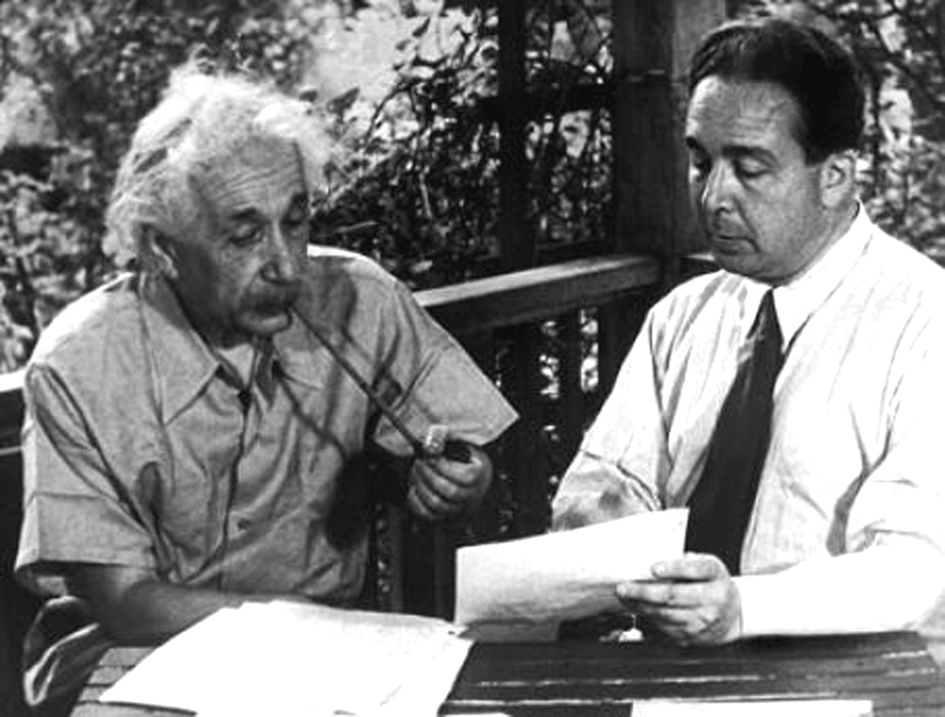 1948 staged photo of physicists Albert Einstein and Leó Szilárd recreating their collaboration on a 1939 letter to Franklin Roosevelt urging the development of atomic weapons.