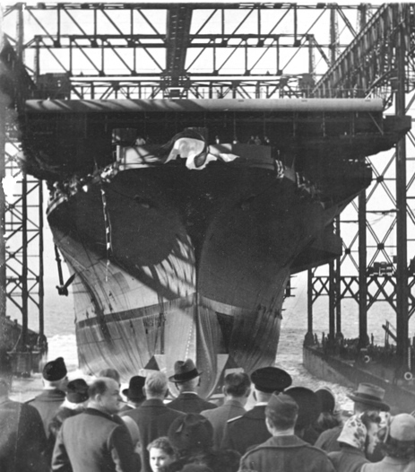 Essex-class carrier Ticonderoga sliding down the ways during her launch at Newport News, Virginia, United States, 7 Feb 1944.
