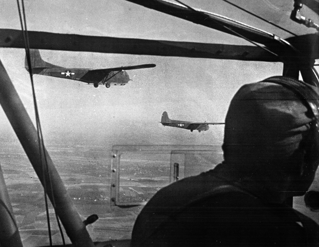 CG-4A gliders on their way to deliver troops during Operation Varsity in western Germany, 24 Mar 1945.