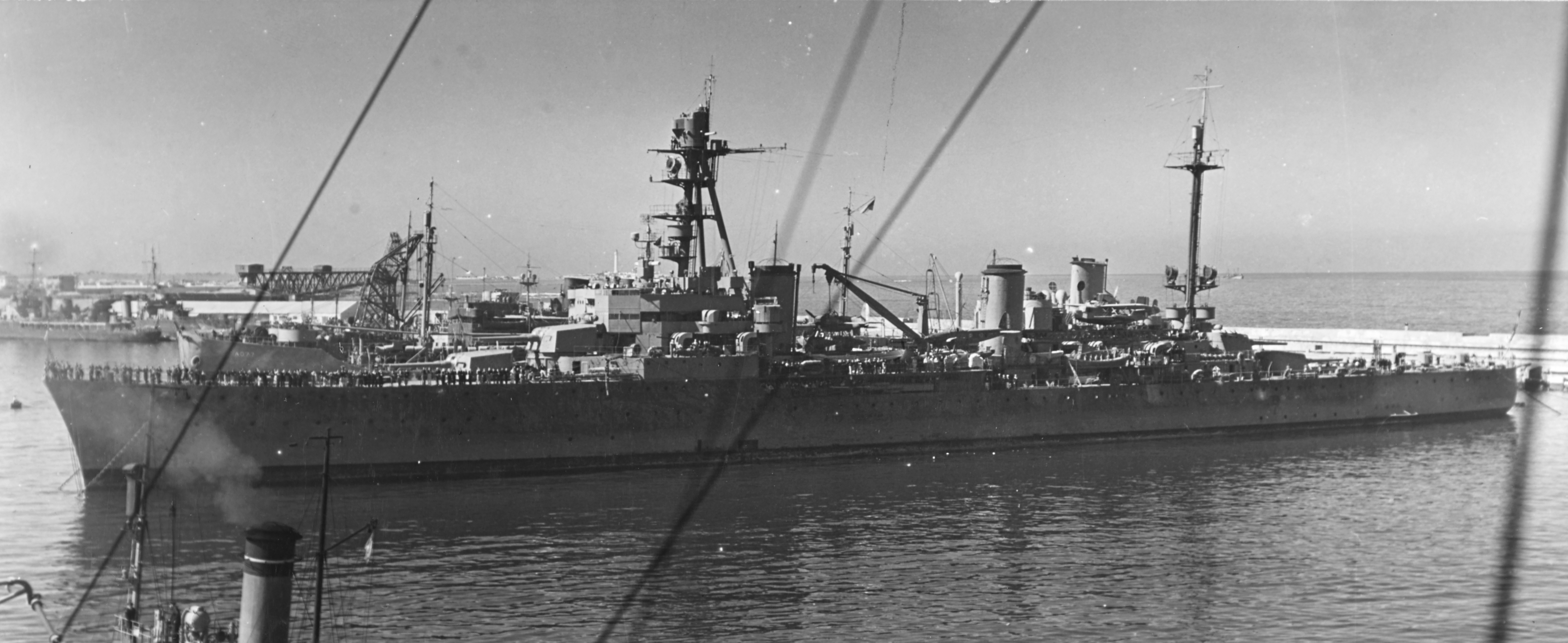 Tourville at Casablanca, Morocco, circa Aug-Nov 1943; note Loire 130 flying boat and wo Latécoère 298 floatplanes stowed between the stacks, USS Cossatot and other French ships in background
