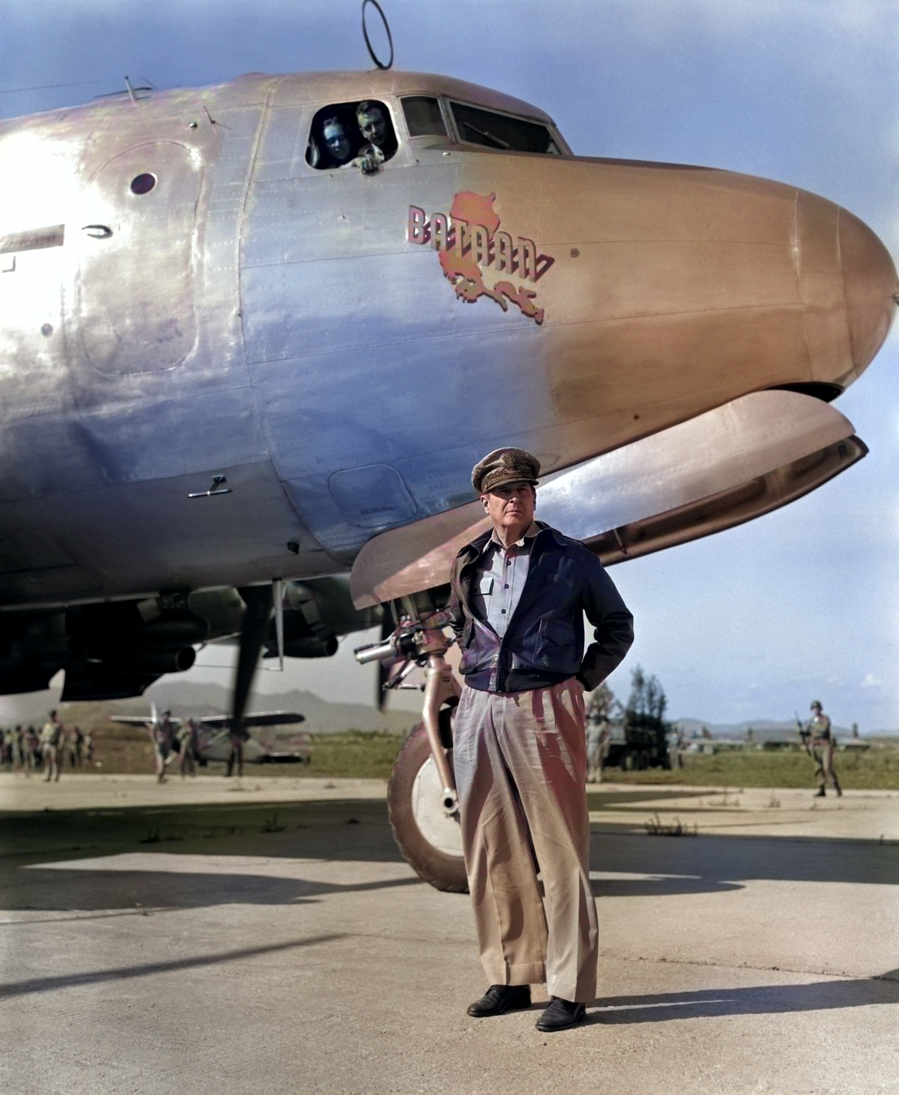 Douglas MacArthur in Korea, 1950-1951; note MacArthur's personal C-54 Skymaster transport aircraft 'Bataan' [Colorized by WW2DB]
