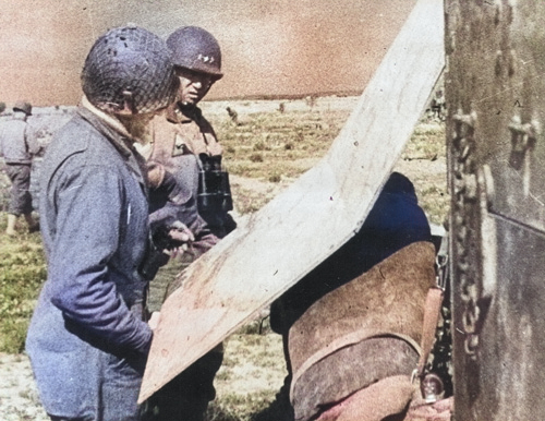 George Patton studying a map in Tunisia, spring 1943 [Colorized by WW2DB]