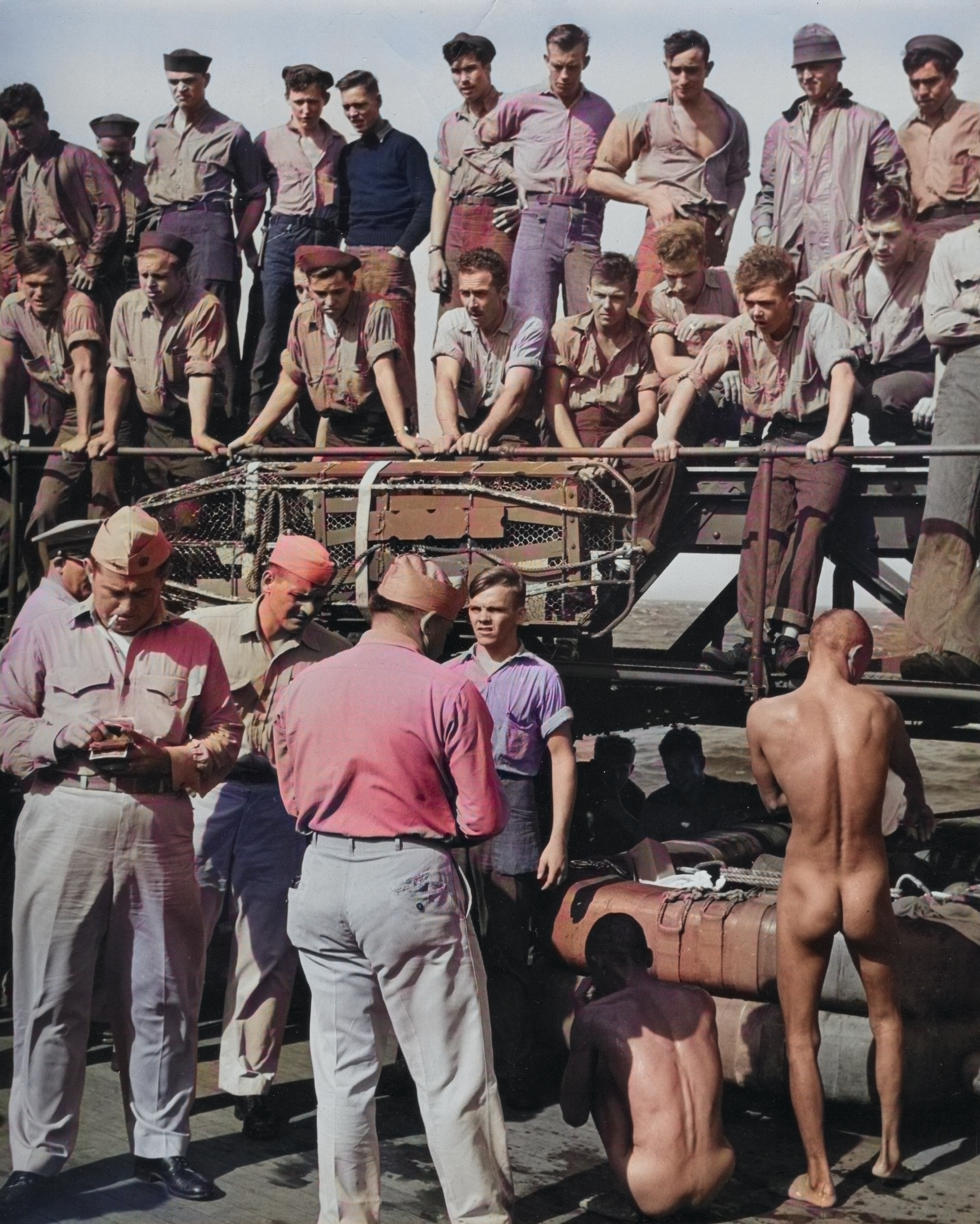 Public humiliation of Japanese prisoners of war aboard USS New Jersey, Dec 1944, photo 1 of 6 [Colorized by WW2DB]