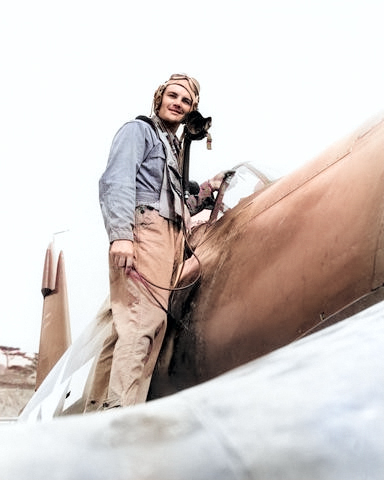 US Marine Corps pilot First Lieutenant Williams L. Hood on a US Navy F4U Corsair fighter, Okinawa, Japan, 1945 [Colorized by WW2DB]