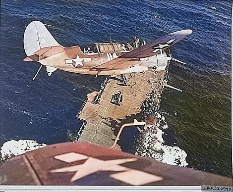 Helldiver aircraft over Hornet, South China Sea, mid-Jan 1945, photo 2 of 2 [Colorized by WW2DB]