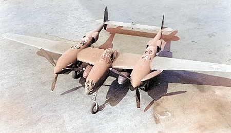 P-38G Lightning aircraft at rest, 1942-1943 [Colorized by WW2DB]