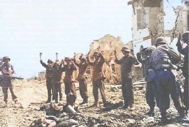 German prisoners of war at Cisterna, Italy, late May 1944 [Colorized by WW2DB]