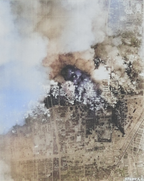 Nagoya, Japan during attack, seen from an American aircraft, 1945 [Colorized by WW2DB]