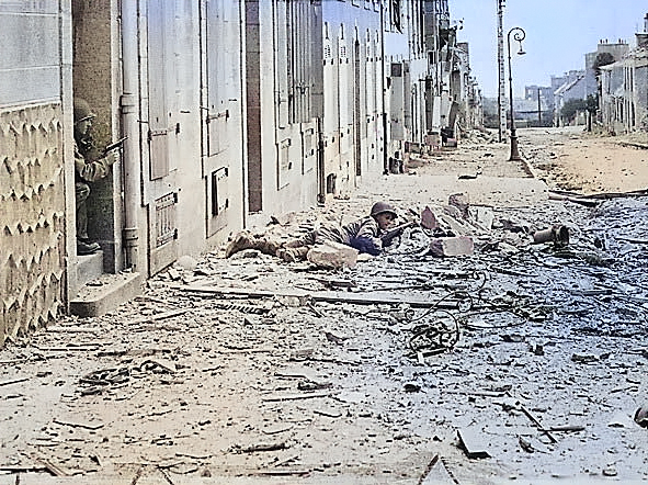 US Army soldiers fighting in the streets of Brest, France during the mop up operations, Sep 1944 [Colorized by WW2DB]