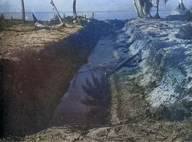 Japanese anti-tank ditch on Makin, Gilbert Islands; seen in US Army publication TM E 30-480 'Handbook On Japanese Military Forces' dated 15 Sep 1944 [Colorized by WW2DB]