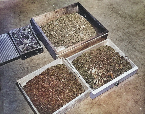 Boxes of gold caps and dentures removed from prisoners in Buchenwald Concentration Camps, near Weimar, Germany, Apr-May 1945 [Colorized by WW2DB]