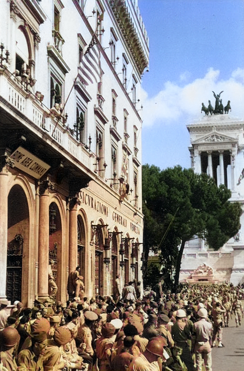 American troops in Rome, circa Jun 1944; note the 'Rome Area Command' building on left and Victor Emmanuel II Monument in background [Colorized by WW2DB]