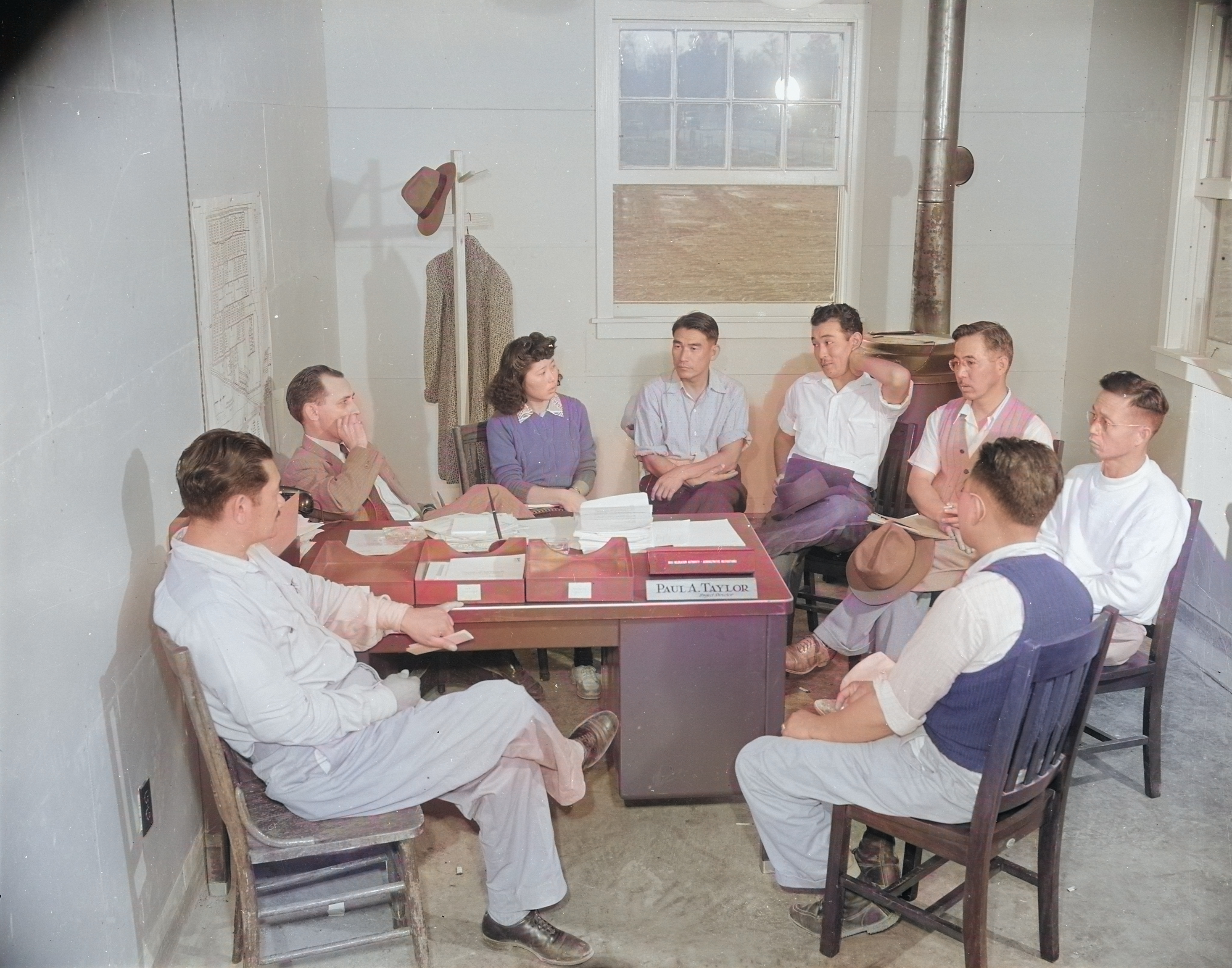 Project Director Paul Taylor speaking with the Council Committee of Jerome War Relocation Center, Arkansas, United States, 18 Nov 1942, photo 1 of 2 [Colorized by WW2DB]