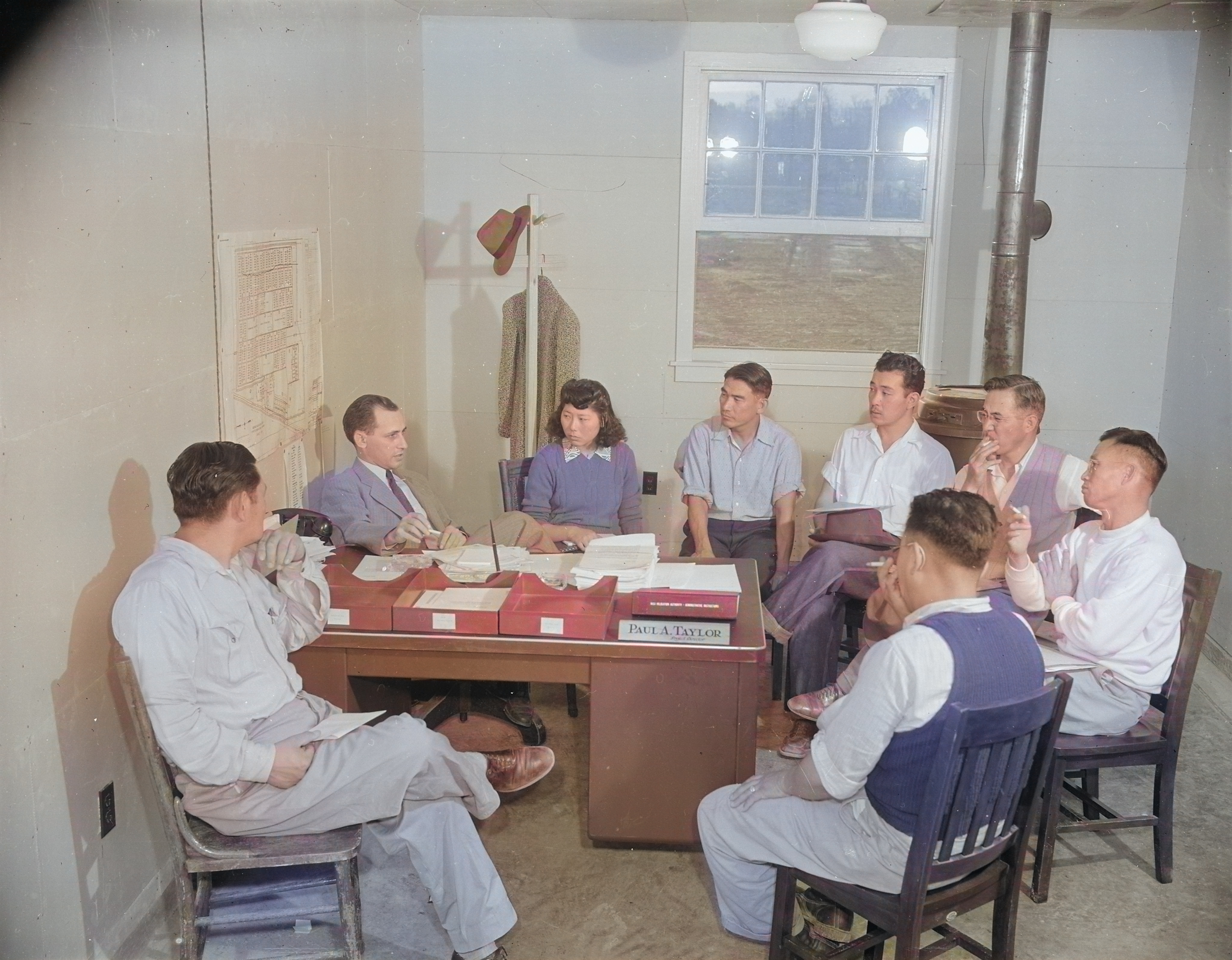 Project Director Paul Taylor speaking with the Council Committee of Jerome War Relocation Center, Arkansas, United States, 18 Nov 1942, photo 2 of 2 [Colorized by WW2DB]
