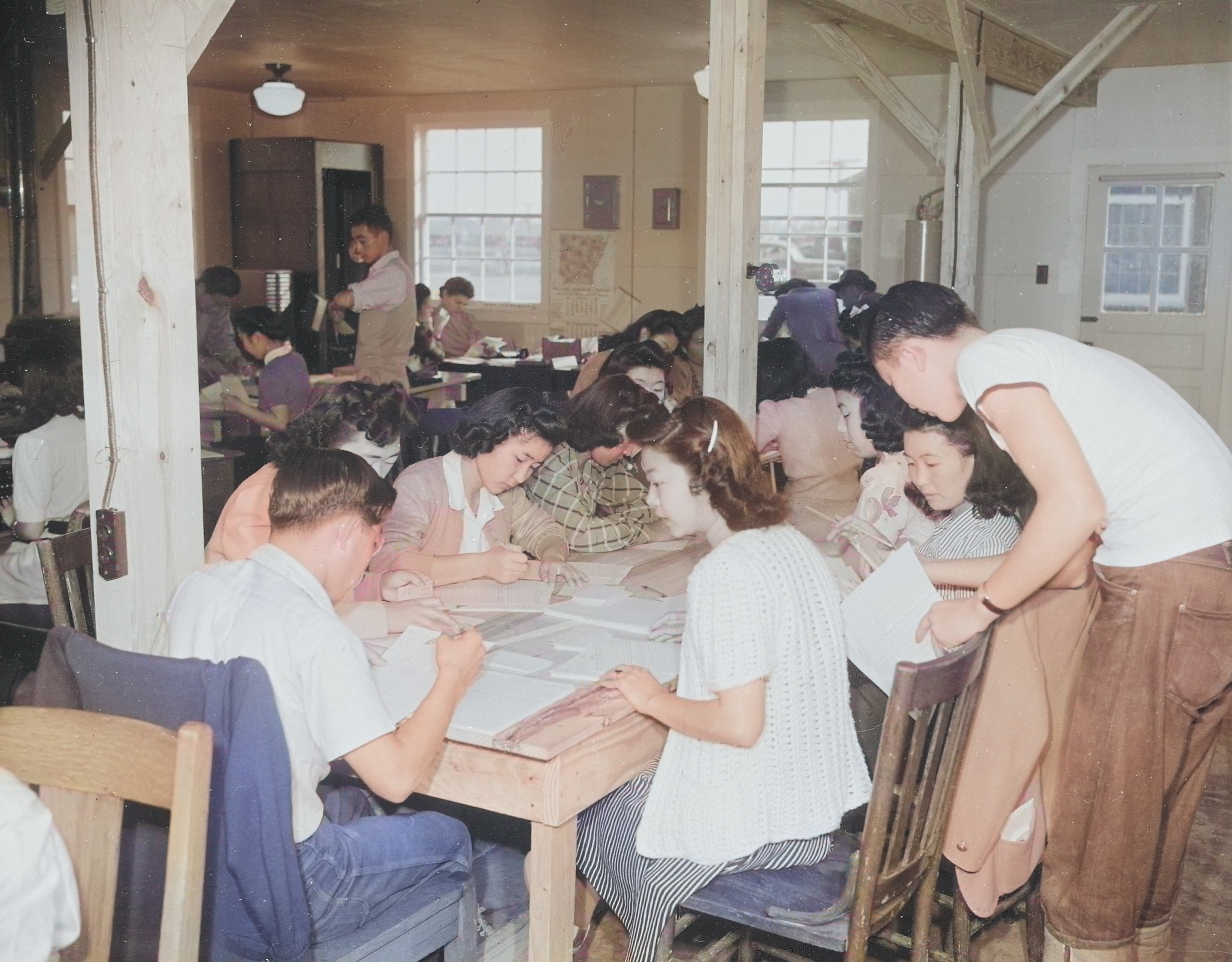 Workers at the Welfare Department of Jerome War Relocation Center, Arkansas, United States, 18 Nov 1942 [Colorized by WW2DB]
