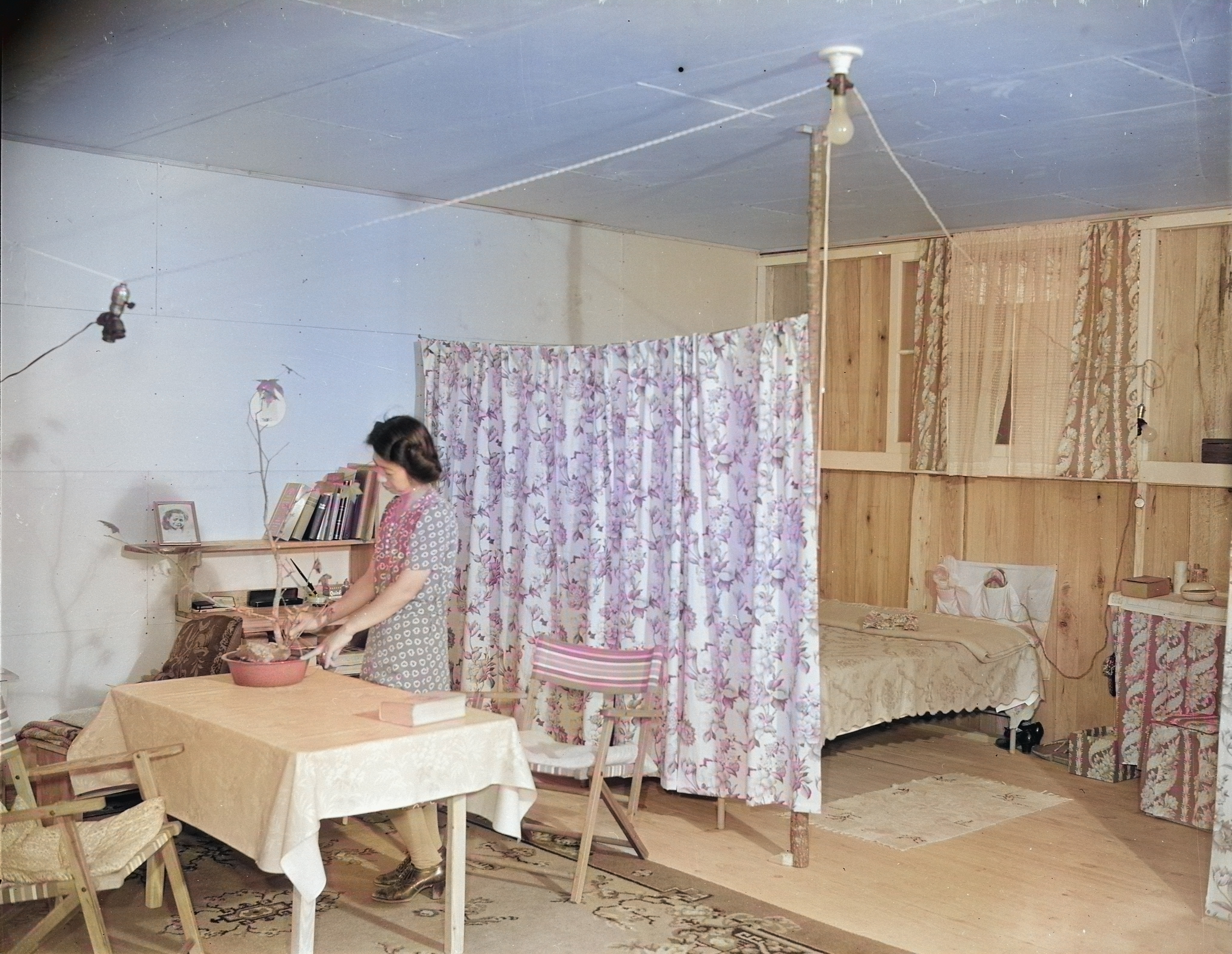 View of the interior of a typical barracks home at Jerome War Relocation Center, Arkansas, United States, 17 Nov 1942 [Colorized by WW2DB]