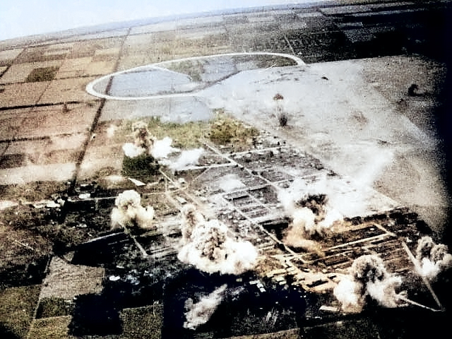 American carrier planes attacking Ushi point airfield, Tinian, Mariana Islands, Jul 1944 [Colorized by WW2DB]