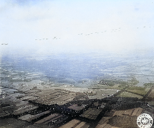 Aerial view of Allied aircraft dropping paratroopers over the Netherlands, 17 Sep 1944 [Colorized by WW2DB]