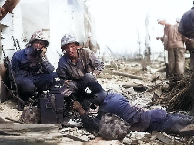 US Marine signalmen setting up a command post in the streets of Roi-Namur, Kwajalein, Marshall Islands, 1 Feb 1944 [Colorized by WW2DB]